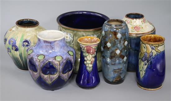 Seven Royal Doulton stoneware vases tallest 20cm
